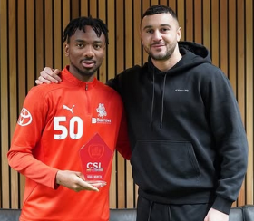 Boxing champion meets Nwakali: Simpson hands Nigeria midfielder Barnsley Goal of the Month prize