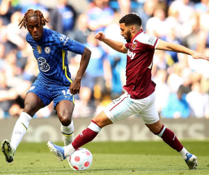  Young defender Alese watches on from the bench as West Ham concede last-minute goal vs Chelsea