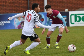 Dutch-Nigerian striker continues where he left off last season with brace for Man Utd U23s