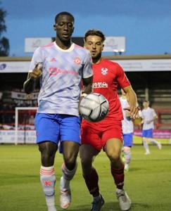 Nigerian-born Arsenal product pictured in trial game for Manchester United U23s